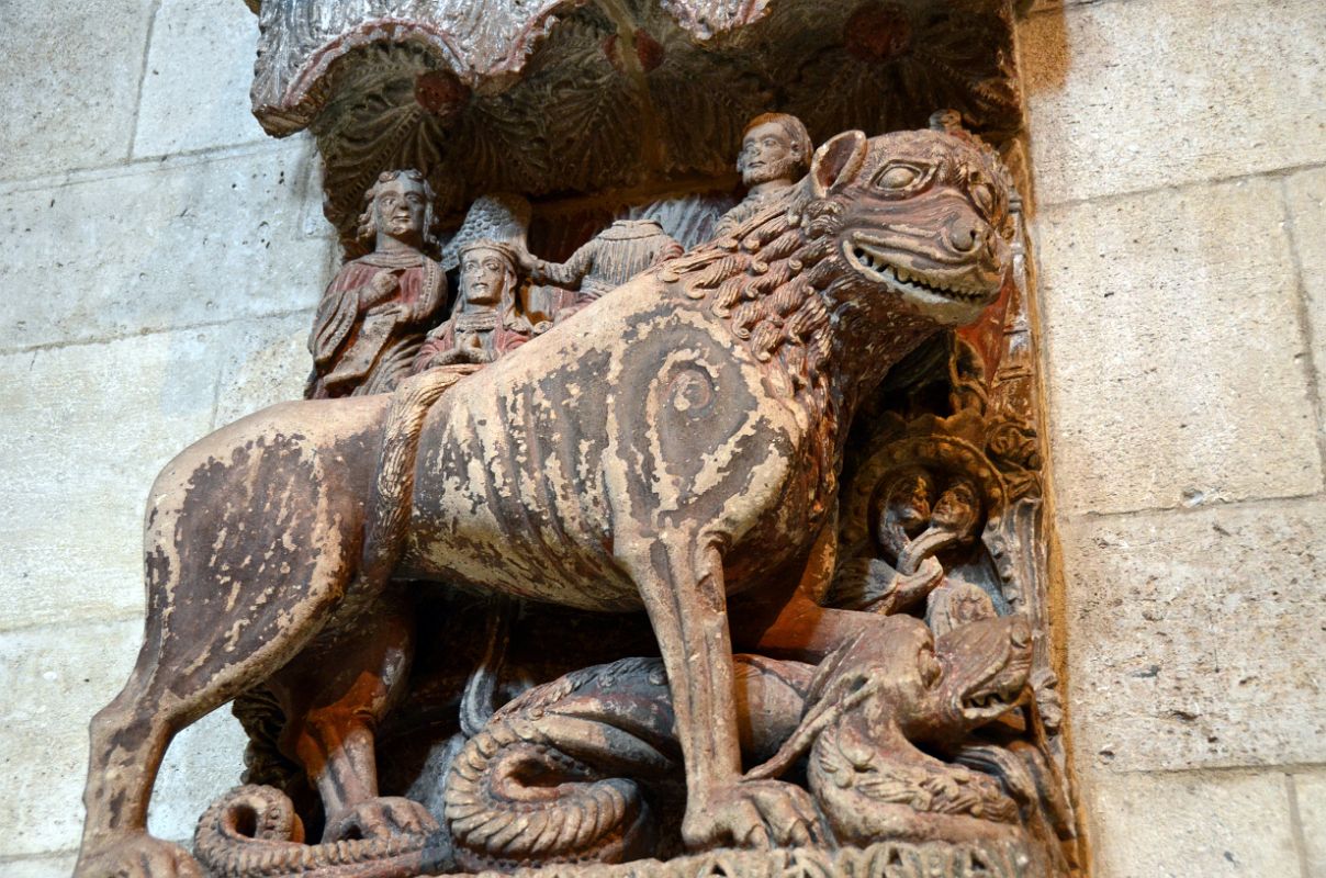 New York Cloisters 14 002 Fuentiduena Chapel - Lion Relief Tramples A Dragon - Spain 1200